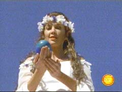 Princess Shayla holds the egg up for the Soul Bird to hatch